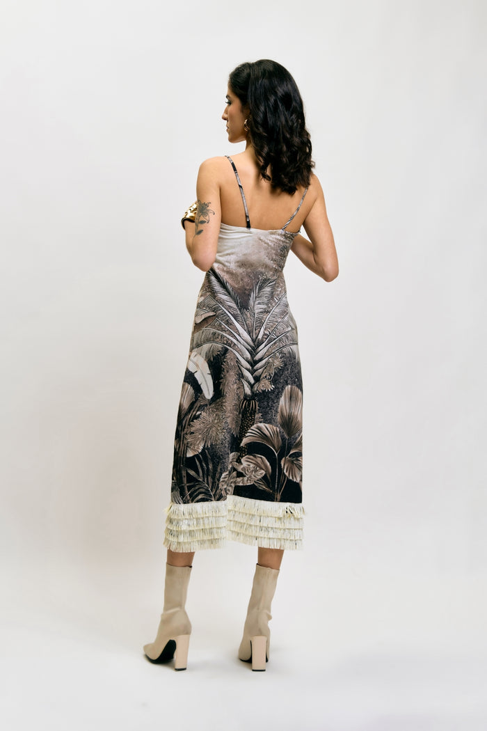 Back view of Afterlight Dress with tropical print and fringe detail