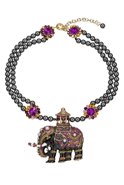 Black double strand beaded necklace with an ornate elephant pendant, multicolor jeweled accents, and gold tone hardware.