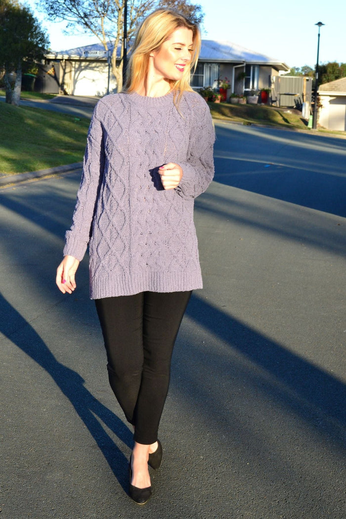 Cafe Latte grape chain stitch knit tunic jumper displayed on a hanger, featuring a textured pattern and relaxed fit.
