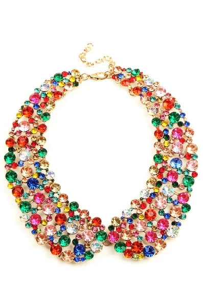 Multicolor collar necklace with clustered rainbow faceted stones arranged in graduated layers and a gold-tone setting.