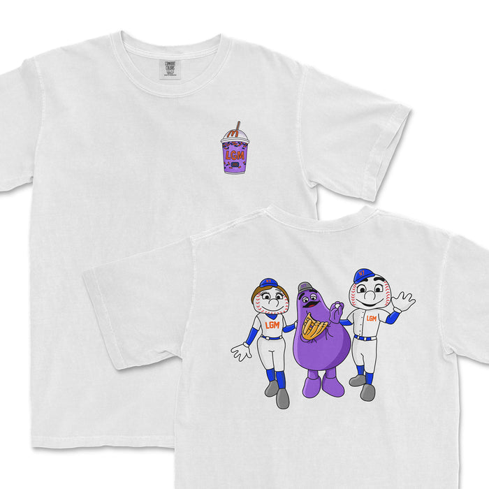 White Comfort Colors T-shirt featuring cartoon characters of baseball players and a purple mascot, with "NYM AND FRIENDS" design.