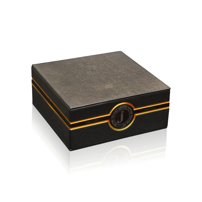 Jamr Al Oud luxury perfume gift box with black and gold accents on white background