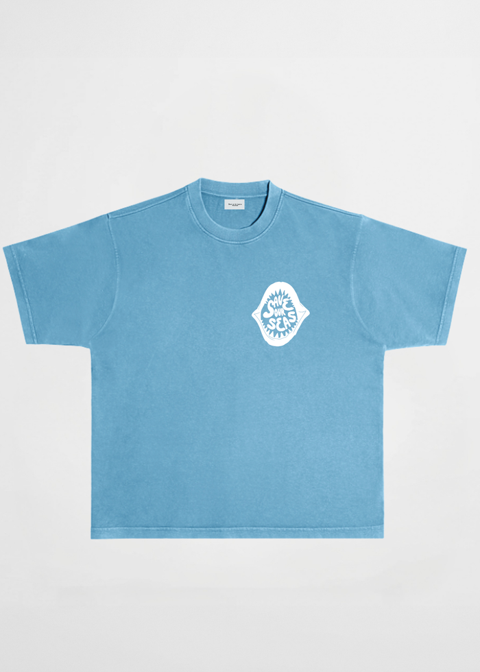 Light blue t-shirt with a white shark logo "save our seas"