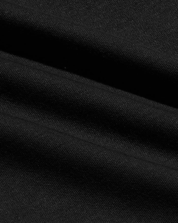 Close-up of soft black fabric texture highlighting the smooth weave and quality of the Tall Pima Cotton Blend Crew 7-Pack for men's basics.