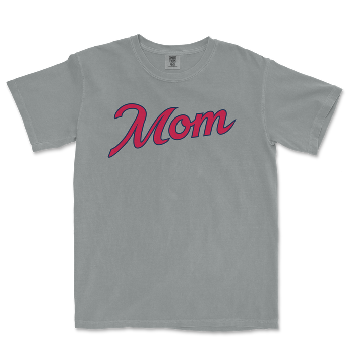 Gray Comfort Colors T-shirt with "Mom" written in pink and navy cursive font, designed for Atlanta baseball moms.
