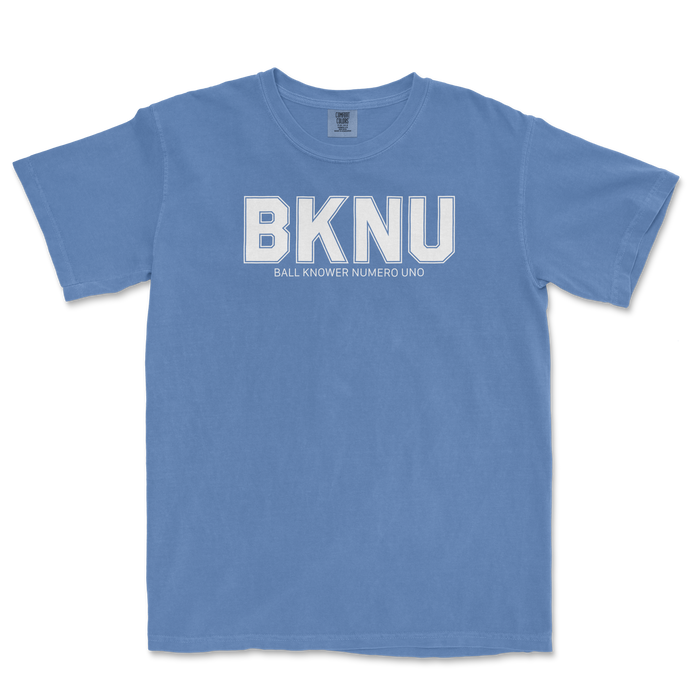 Blue Comfort Colors T-shirt featuring "BKNU" and "Ball Knower Numero Uno" text in white, casual style for fans of the game.