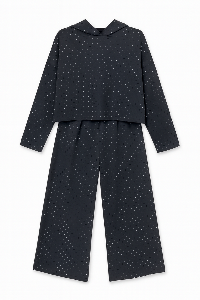 Black crystal lounge set with a long sleeve top and matching wide leg pants accented by a subtle sparkling dot pattern.