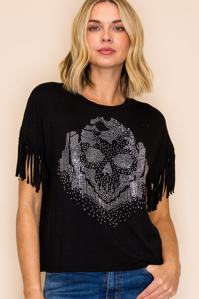 Black graphic tee with a sparkling crystal skull design on the front and fringe detail on the short sleeves.