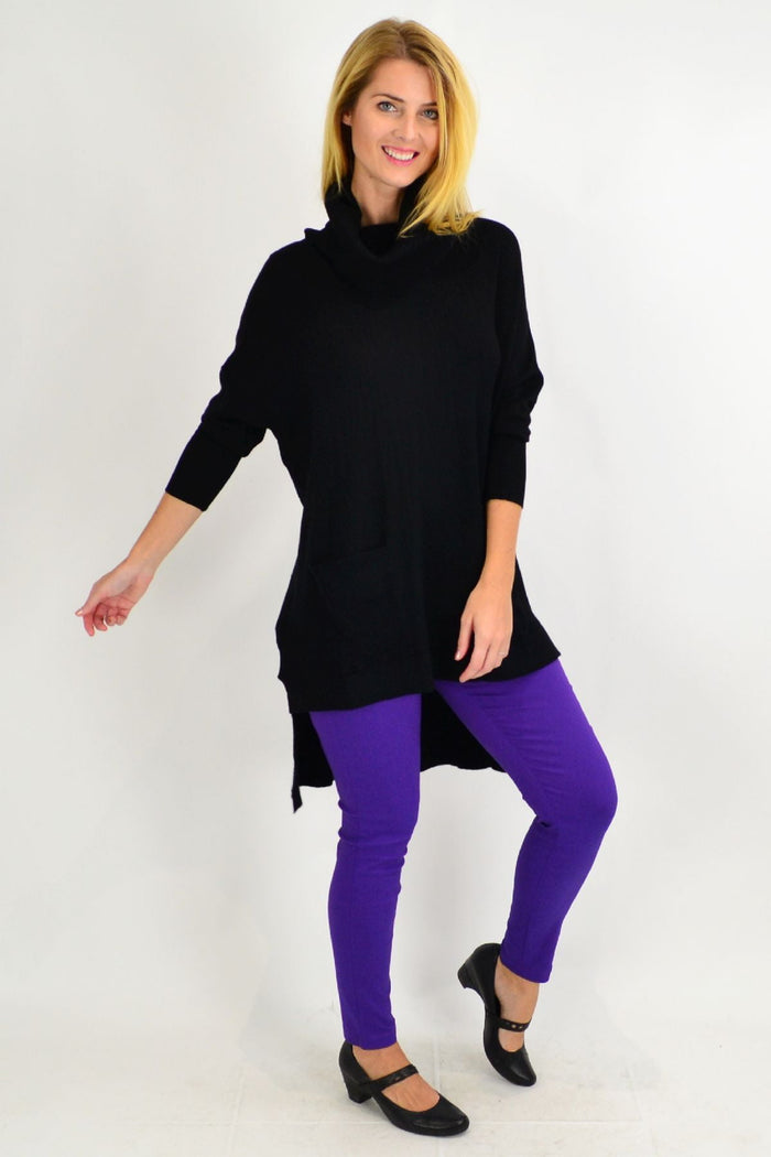 Black Taylor winter knit tunic by Cali&Co with long sleeves and cozy fabric, displayed on a hanger.