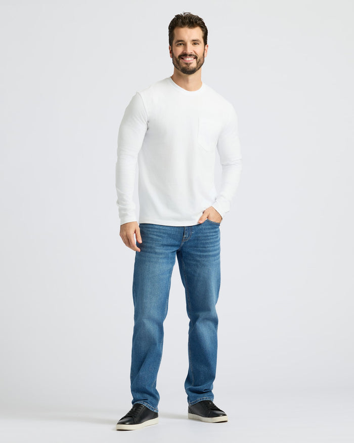Man wearing White Heavyweight Long Sleeve Pocket Crew from 2-Pack.