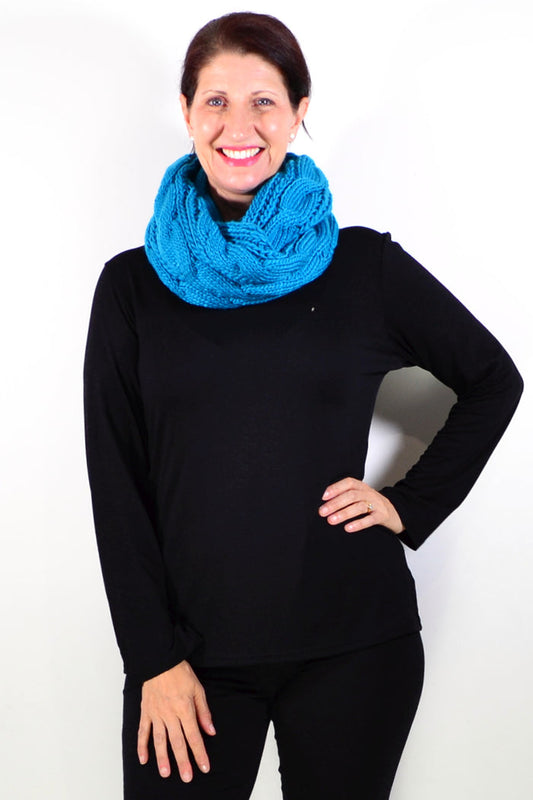 Blue infinity snood scarf by I Love Tunics, showcasing a circular knitted scarf with a cozy, stylish design.