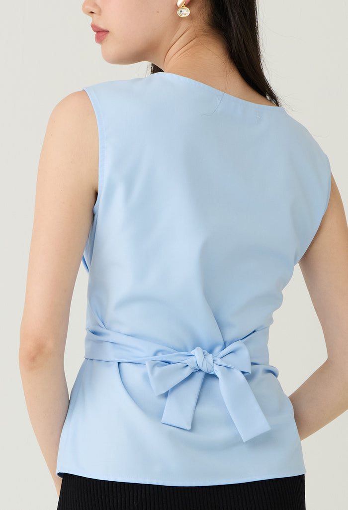 Bow Detail Sleeveless Peplum Blouse