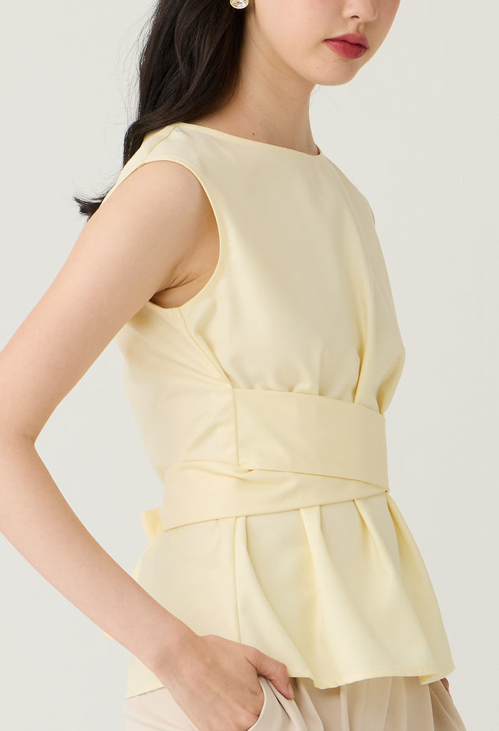 Bow Detail Sleeveless Peplum Blouse
