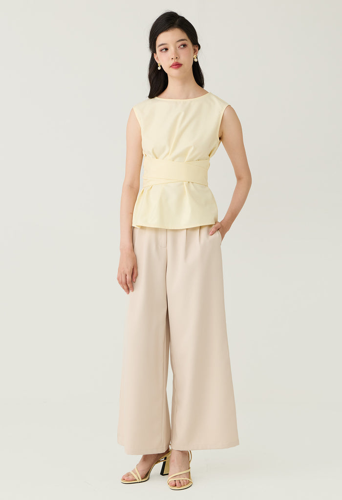 Bow Detail Sleeveless Peplum Blouse