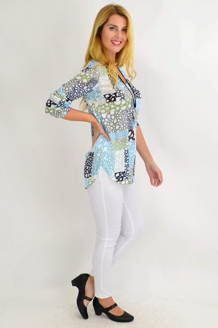 Cafe Latte bubble bath V-neck tunic top, lightweight and flowy, shown in a stylish casual fit with soft fabric details.