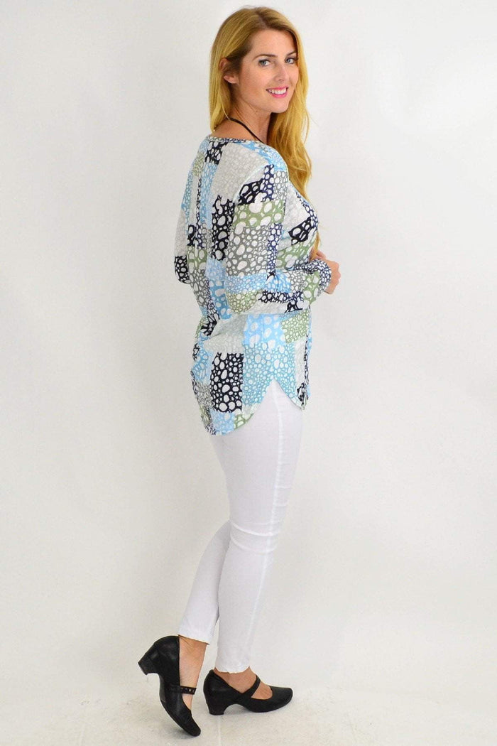 Spot-print winter Bubble Bath V-neck tunic top for ladies by Cafe Latte featuring a relaxed fit and long sleeves.