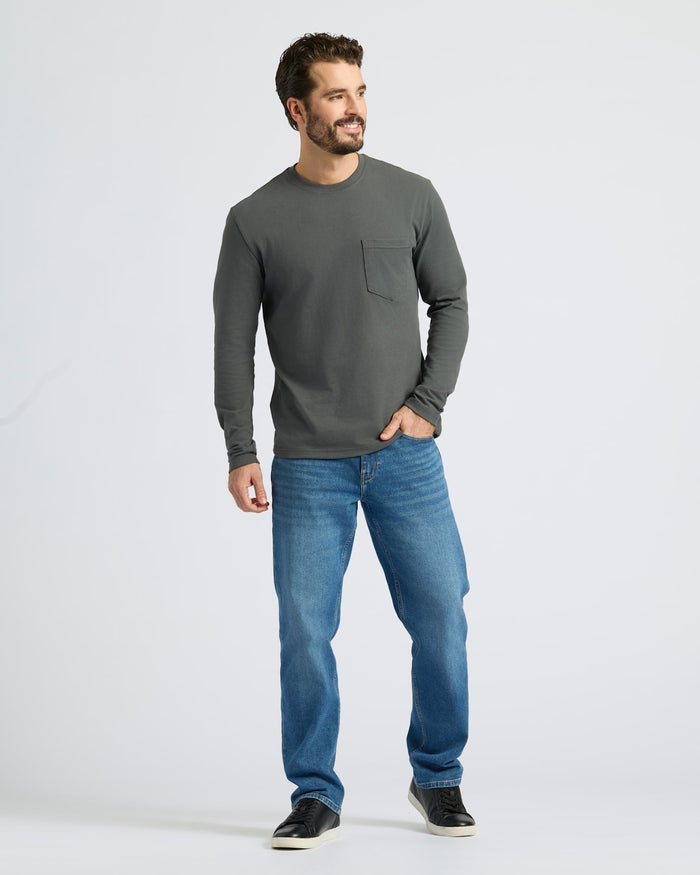 Man in Staple Heavyweight Long Sleeve Pocket Crew with jeans.