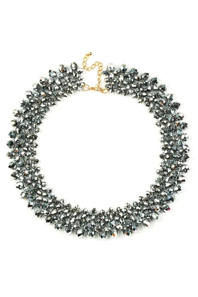 Charcoal grey Anita statement necklace with layered faceted beads and a gold-tone adjustable chain.