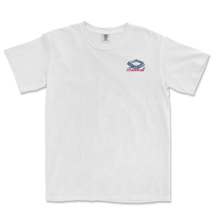 White t-shirt featuring a baseball graphic and "Baseball" text, celebrating America's pastime for sports fans.