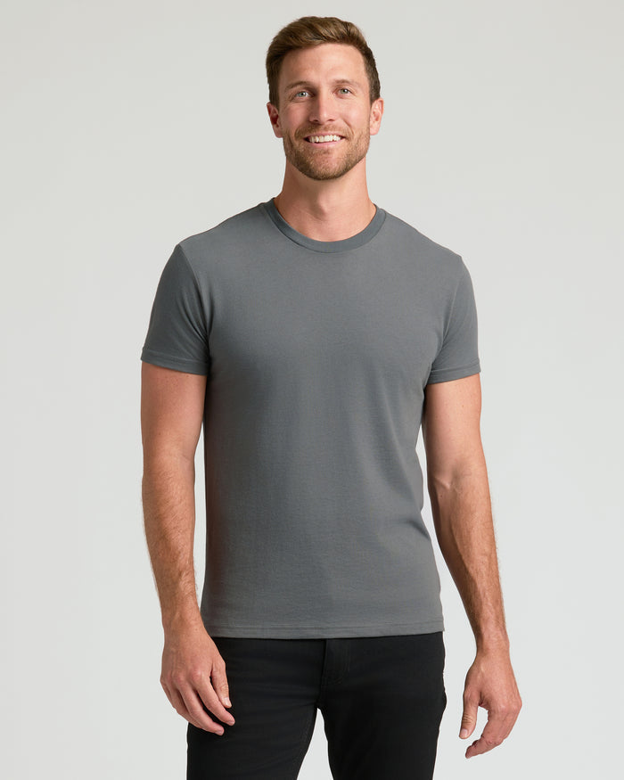 Man wearing Classic Crew Neck 6-Pack T-shirt, fitted and short-sleeved.