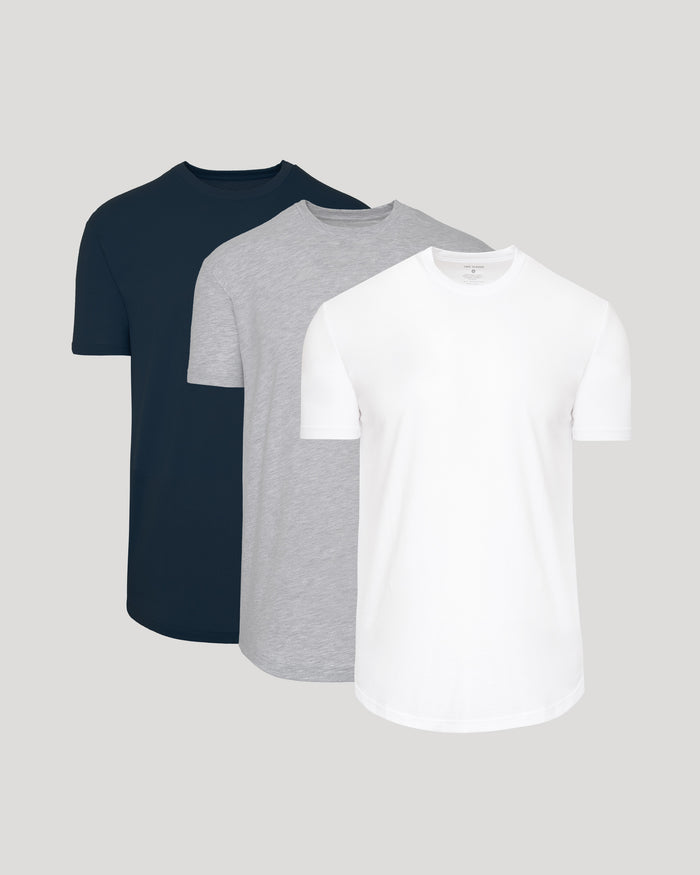 Three men's basic crew neck t-shirts in navy, gray, and white with a curved hem design, shown as the Classic Curved Hem Crew Neck 3-Pack.