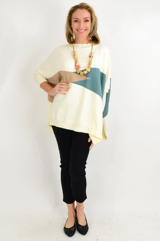 Cream Cali&Co knit tunic with a cozy crew neck, styled as a weekend crew neck jumper for casual wear.