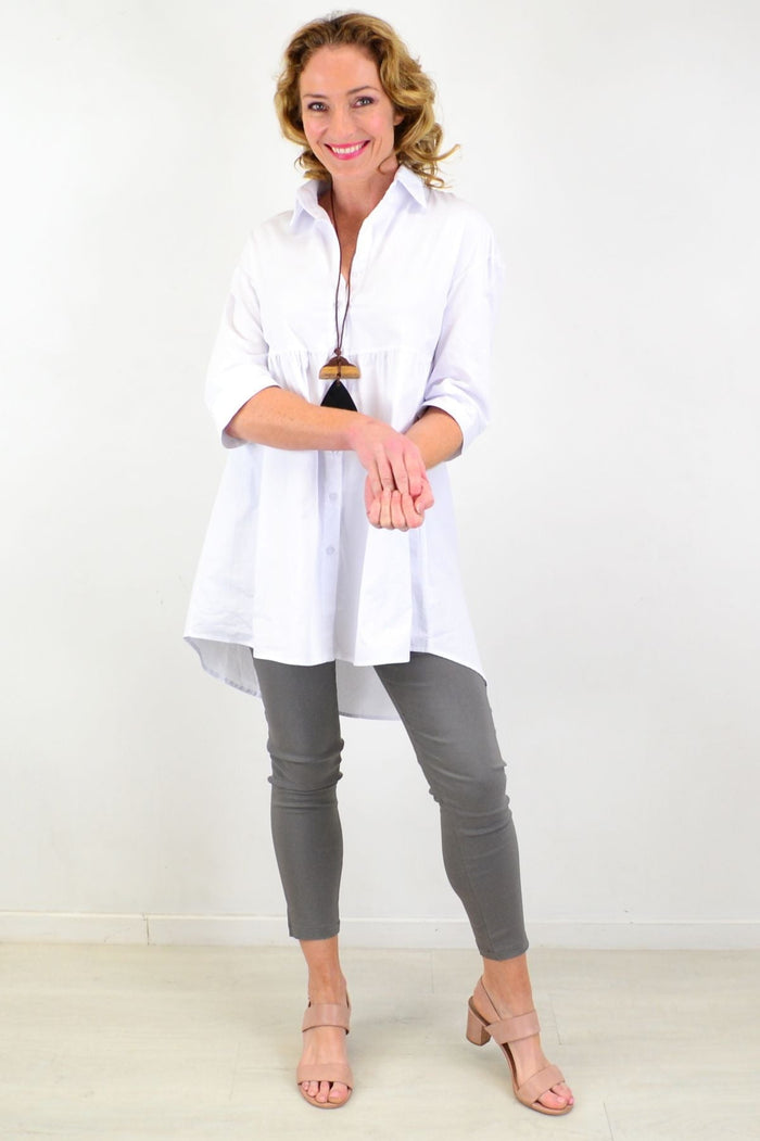 White Hourglass tunic shirt with a trendy, crisp design, featuring a relaxed fit and stylish collar.