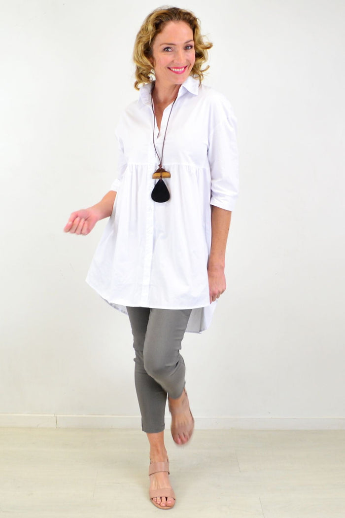 White tunic shirt by Hourglass, trendy and crisp, featuring a relaxed fit and stylish design perfect for casual or office wear.