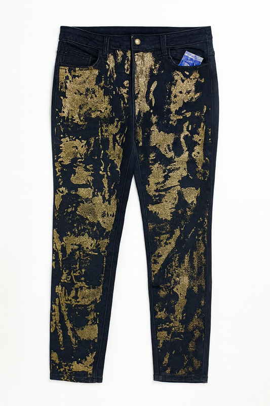 Dark denim skinny jeans with bold metallic gold foil embellishment and classic 5-pocket styling.