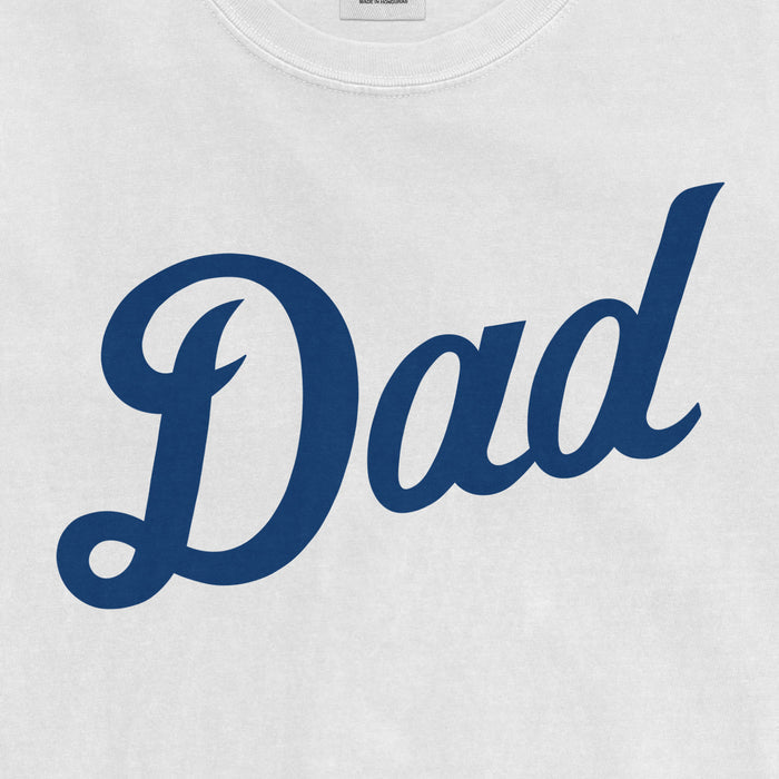 White Comfort Colors T-shirt with blue "Dad" text in a bold, cursive font, celebrating Detroit baseball dads.