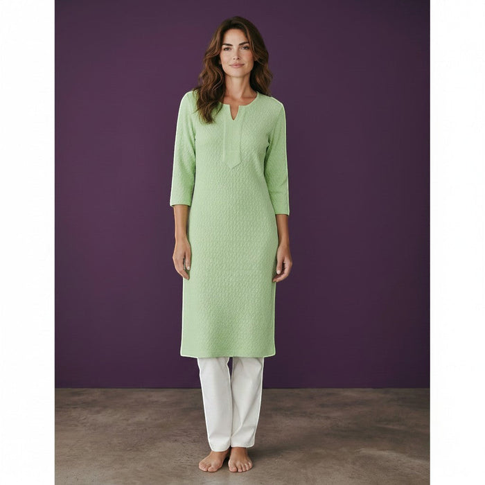 Kurti Connection USA light green textured cotton kurti with 3/4 sleeves and a notched neckline, paired with white trousers.