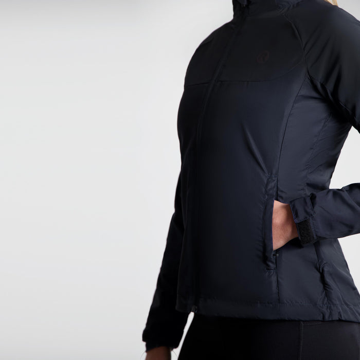 Detail van Rogelli Enjoy III hardloopjack dames paars zakken zijkant.