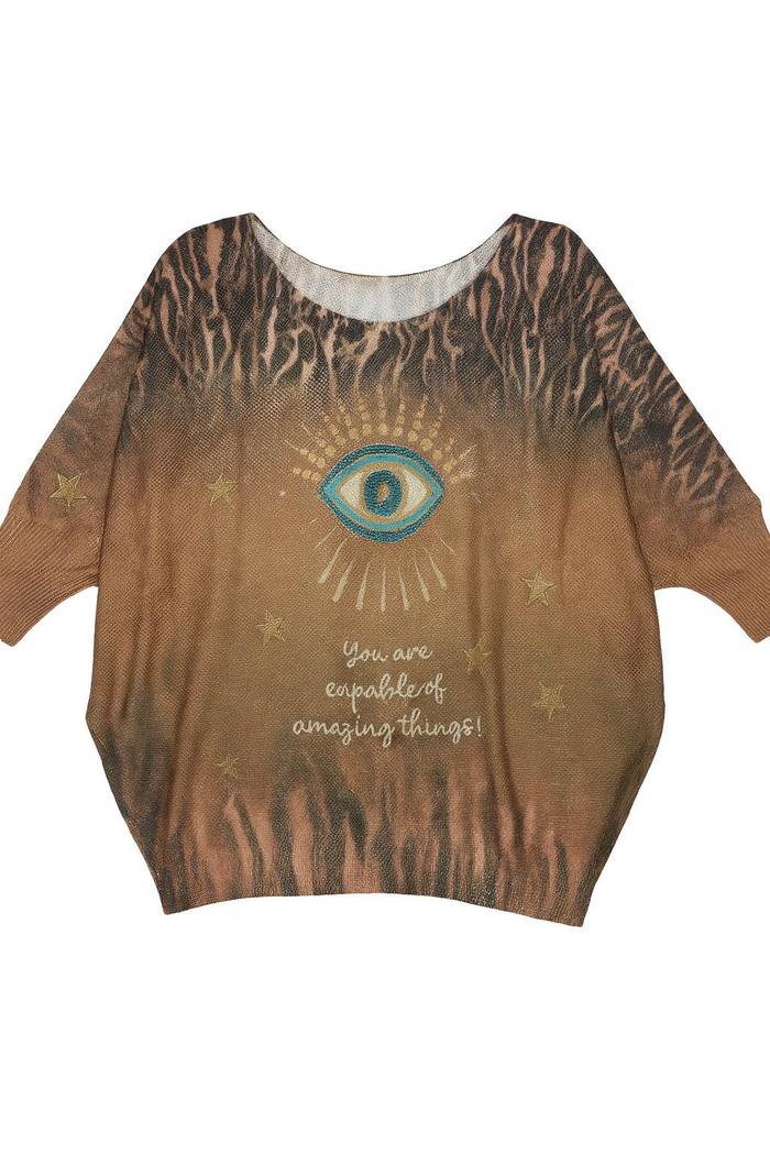Graphic knit sweater with a bold central eye motif, uplifting text, star accents, and animal print fade detail.