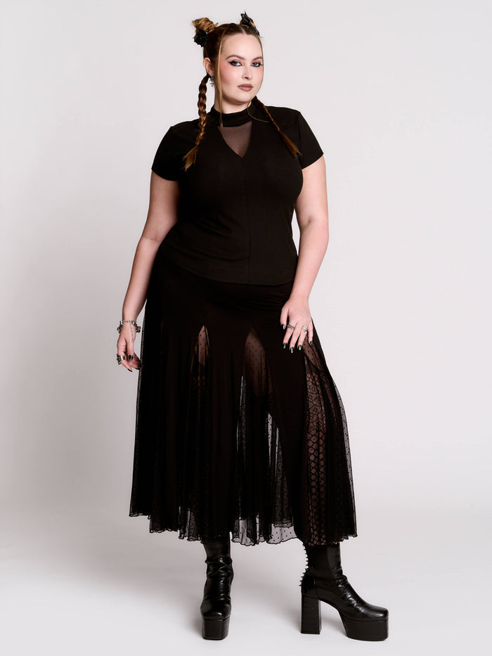 A black short-sleeve mock neck top with a fishnet mesh chest panel.