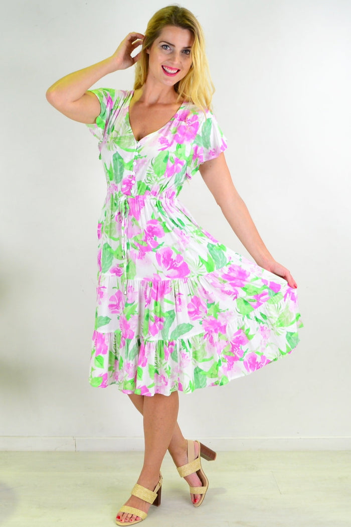 Floral tiered tunic dress from New U Collection featuring a flowy, bohemian style with vibrant floral patterns and layered fabric.