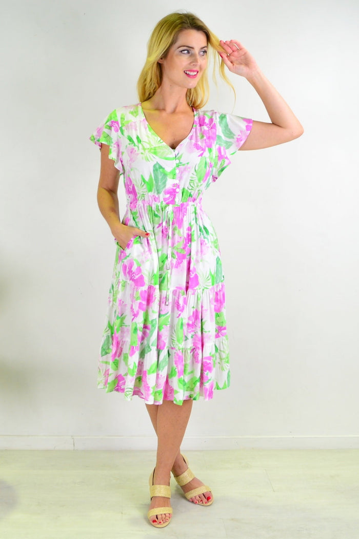 Floral tiered tunic dress from New U Collection with a flowy silhouette and vibrant flower pattern, perfect for casual wear.