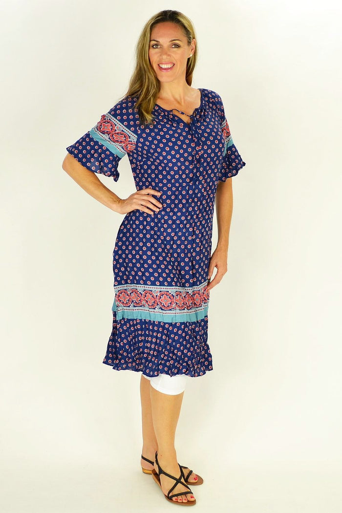 Flower in the Meadow Tunic Dress by Cafe Latte, featuring a floral print on a lightweight, casual tunic with long sleeves.
