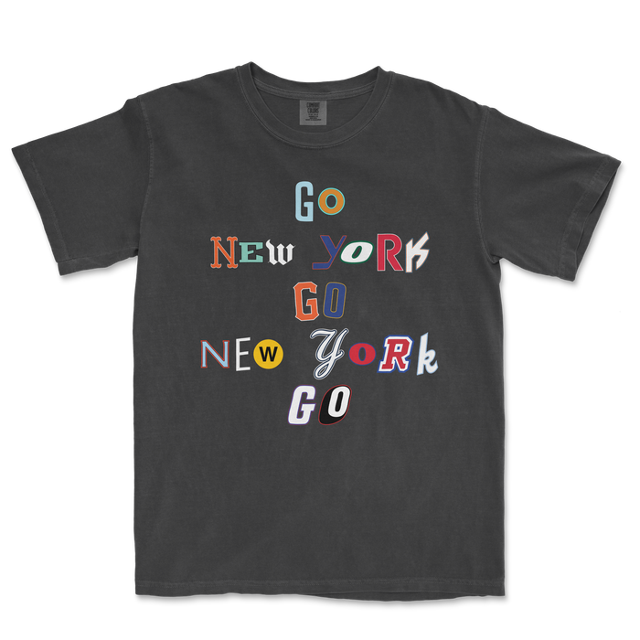 Black t-shirt featuring colorful text design with "Go New York Go" in various fonts and styles, celebrating New York pride.