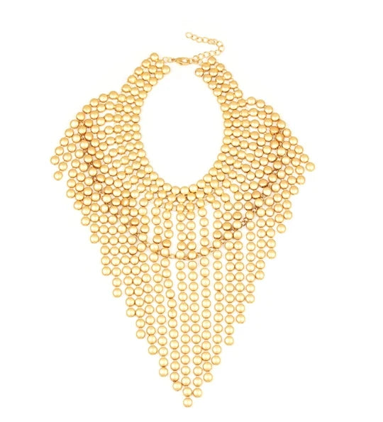 Gold Selah statement necklace with cascading gold-toned beads in a dramatic V-drape silhouette.