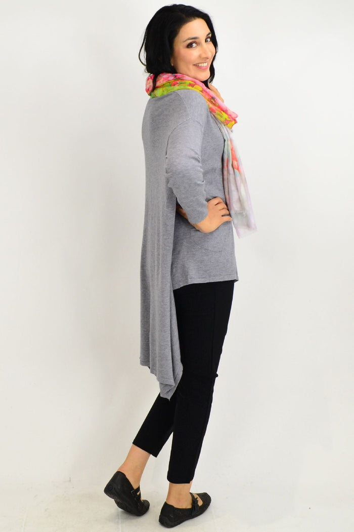 Grey Cali&Co Heidi hi-low tunic jumper with long sleeves, relaxed fit, and side slits, perfect for casual wear.