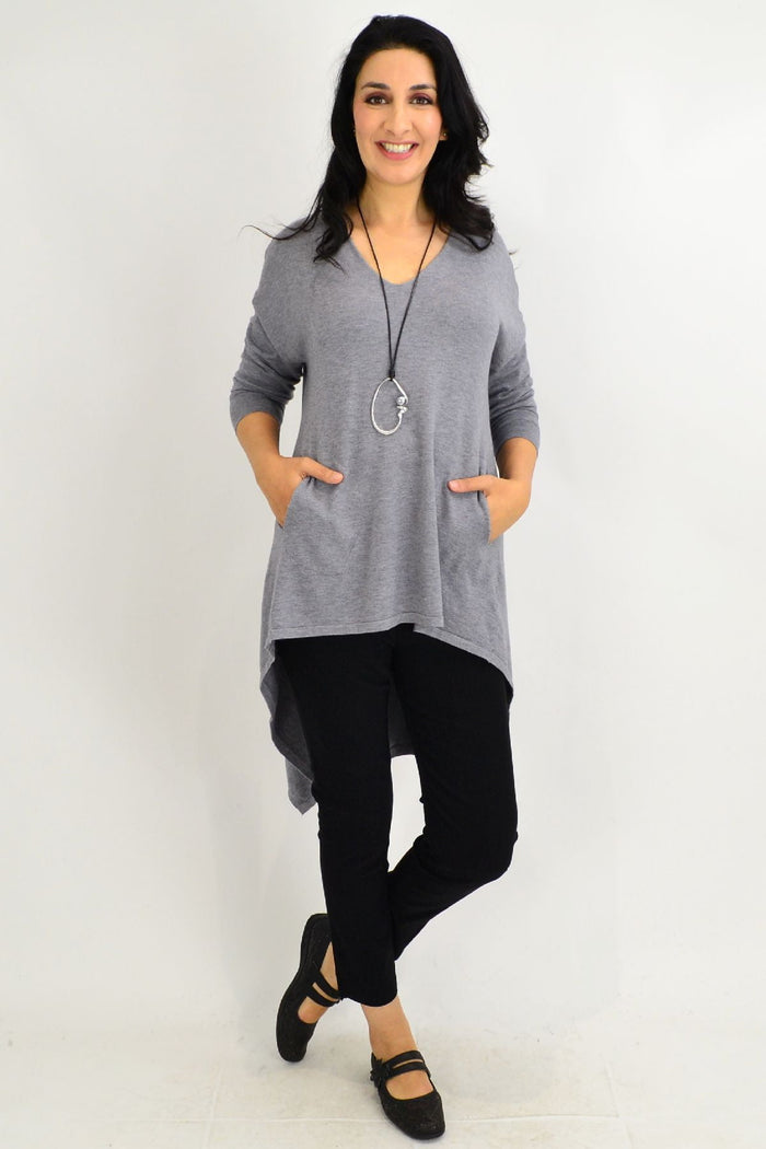 Grey Heidi Hi Low Tunic Jumper by Cali&Co featuring an uneven hem and relaxed fit, perfect for casual and stylish wear.