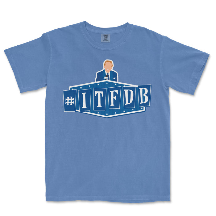 Blue Comfort Colors t-shirt featuring a graphic design of a man at a podium with the hashtag #ITFDB in bold white and blue lettering.