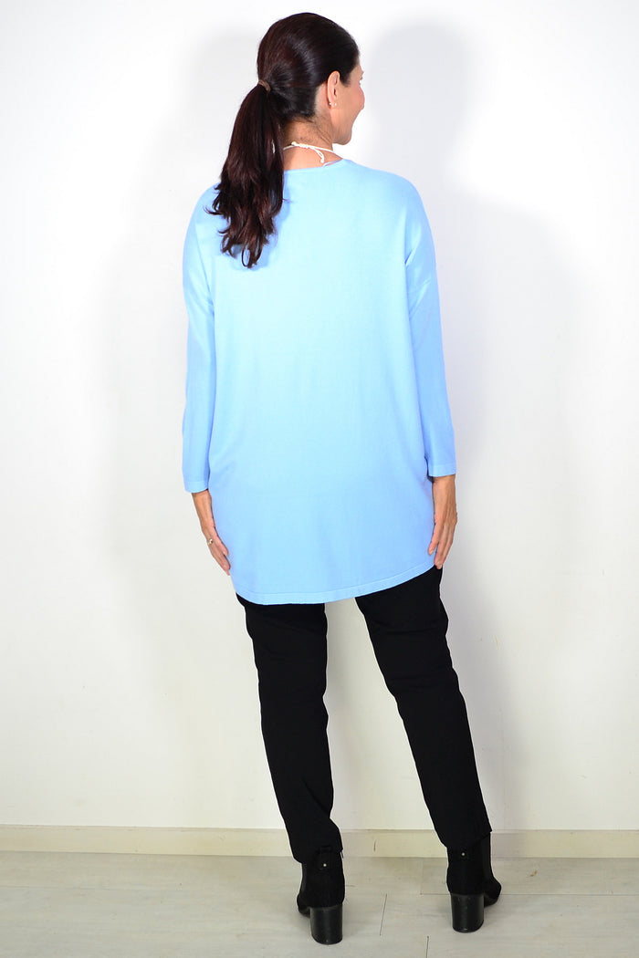 Light blue wool blend fine knit tunic top by Cali&Co, featuring a cozy fit and stylish design, displayed on a hanger.