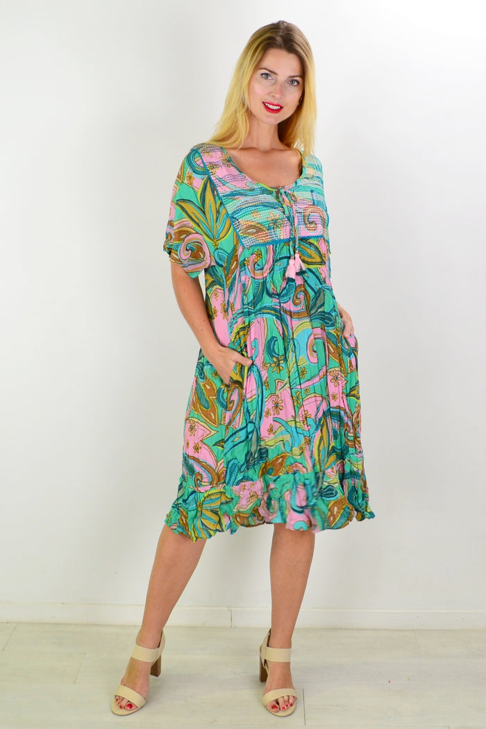 Orientique Mennagio Boho Bib Dress Tunic featuring a relaxed fit, intricate patterns, and lightweight fabric in natural colors.