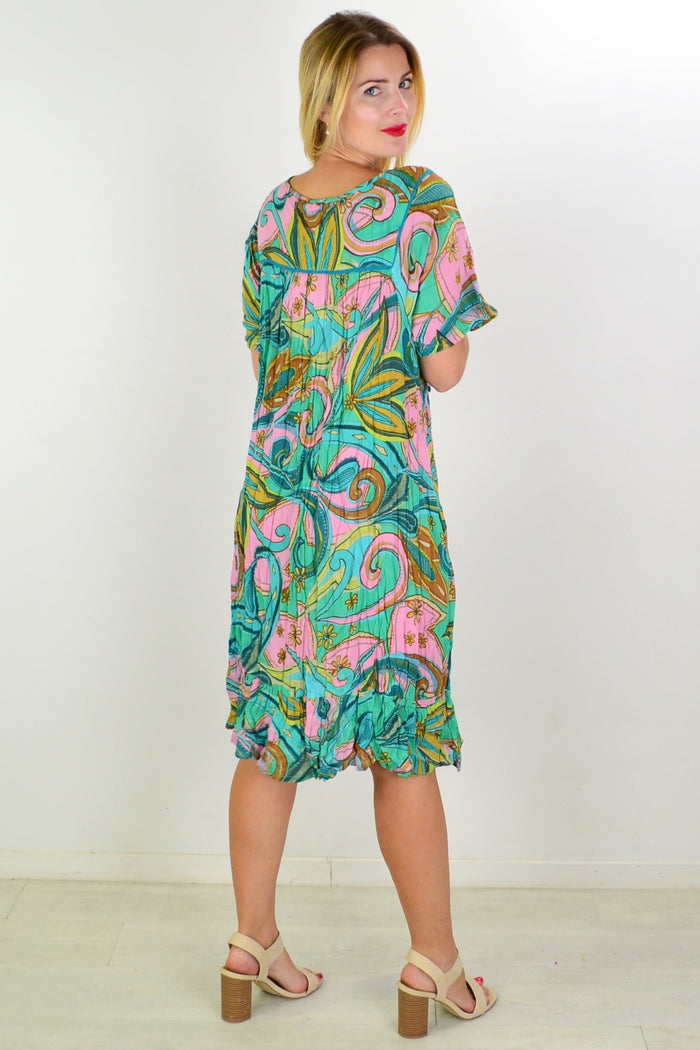 Orientique Mennagio Boho Bib Dress Tunic displayed with flowing fabric, intricate patterns, and relaxed bohemian style.