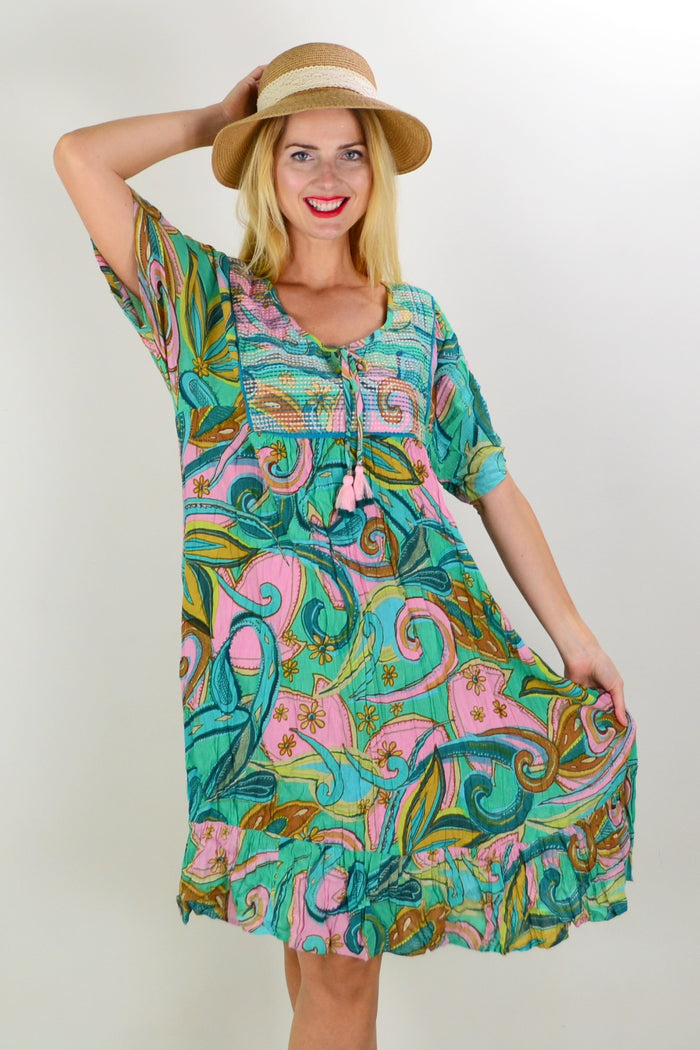 Orientique Mennagio Boho Bib Dress Tunic displayed with its relaxed fit, bohemian style, and lightweight fabric in natural tones.