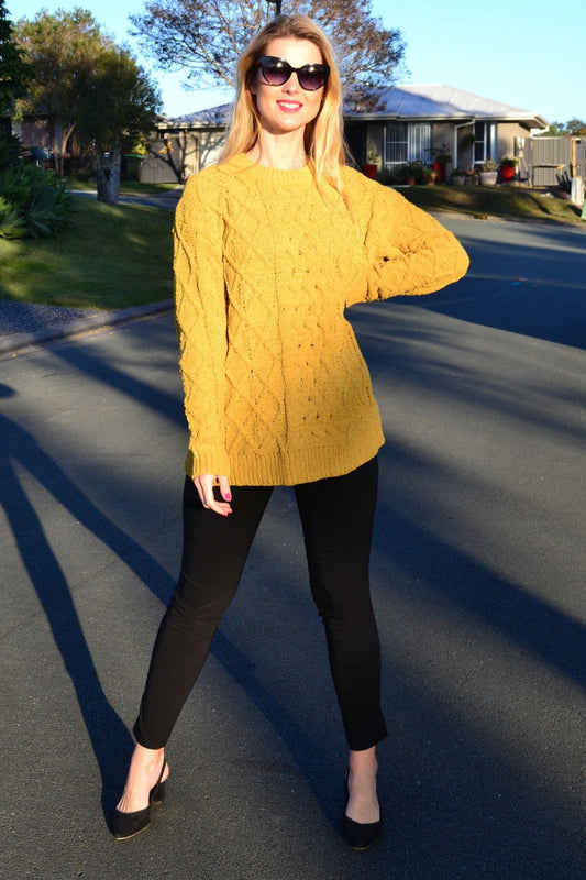 Mustard yellow chain stitch knit tunic jumper by Cafe Latte, showing the textured fabric and relaxed fit.