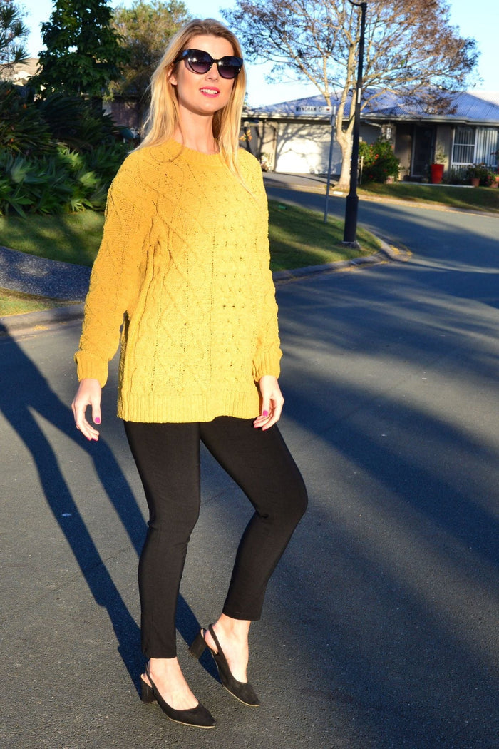 Mustard yellow chain stitch knit tunic jumper from Cafe Latte, showcasing its textured fabric and relaxed fit.
