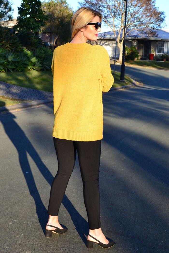 Mustard yellow chain stitch knit tunic jumper by Cafe Latte, featuring a cozy, textured knit fabric and a relaxed fit.