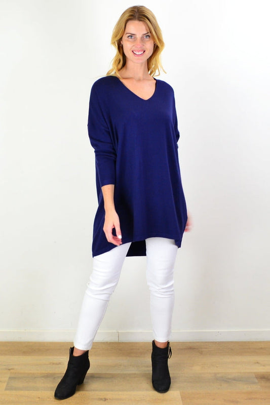 Navy blue wool blend fine knit tunic top by Cali&Co, featuring a soft, fitted design and long sleeves.